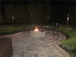 alternatiing onyx natural ledgestone fire pit circle kit nightime firepit